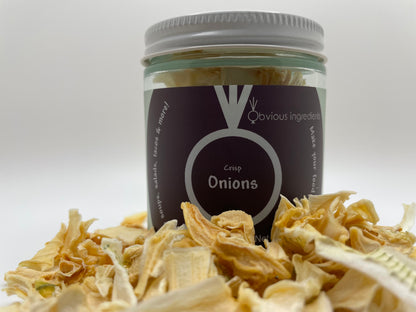 Clear jar of crisp onions with purple label surrounded by chopped dried onions